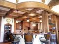 Douglas Fir S4S Timbers / The curved beam was constructed--all materials were distressed and stained onsite
